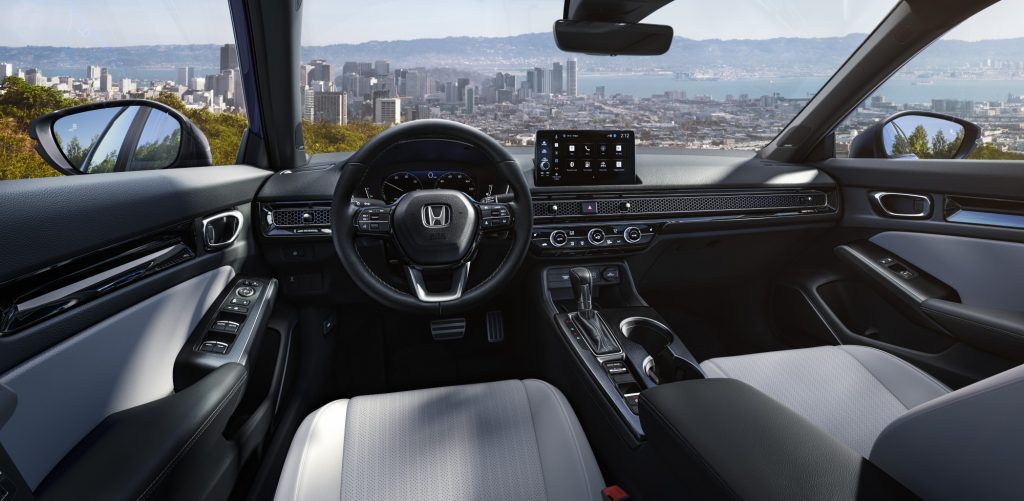 Interior front dash view inside the 2025 Honda Civic Sedan Hybrid.