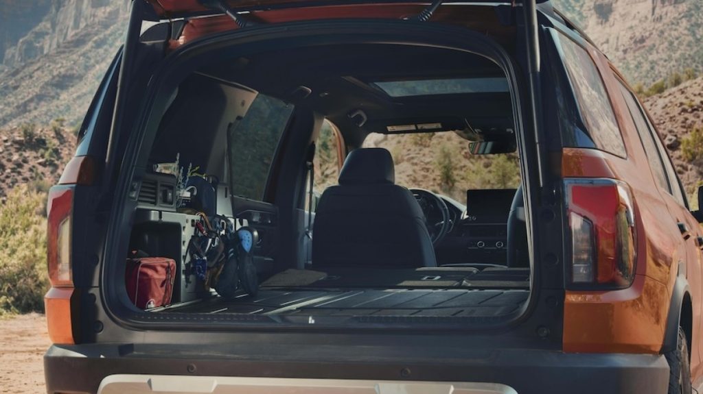 Rear trunk interior view of the 2026 Honda Passport Elite trim.