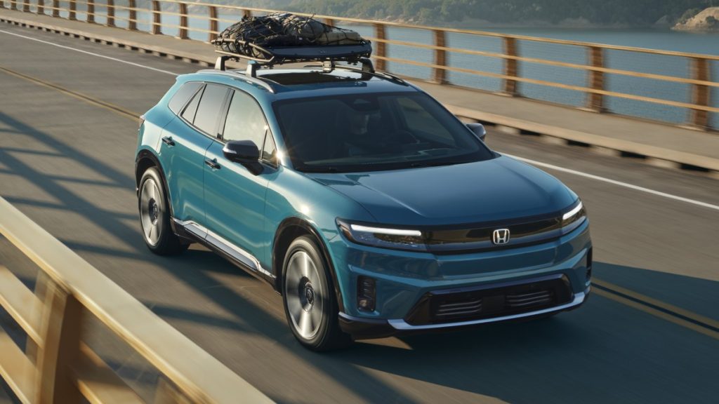 2024 Honda Prologue Elite driving over a bridge