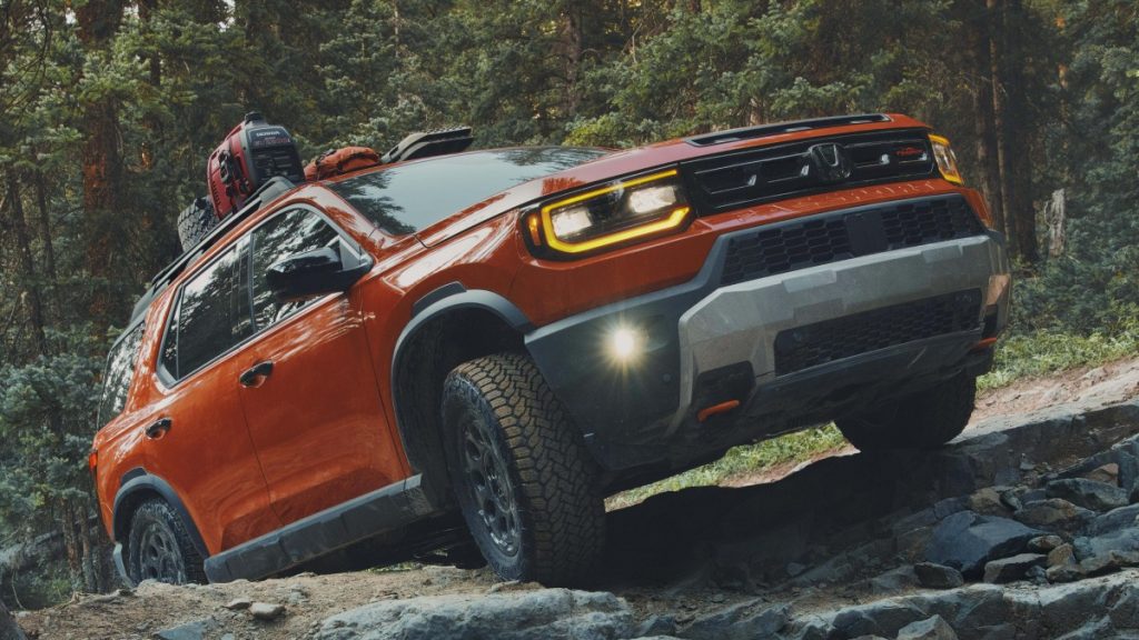 2026 Honda Passport TrailSport off-road driving up a hill