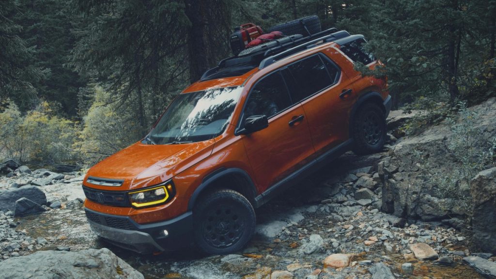 Orange 2026 Honda Passport TrailSport off-road driving