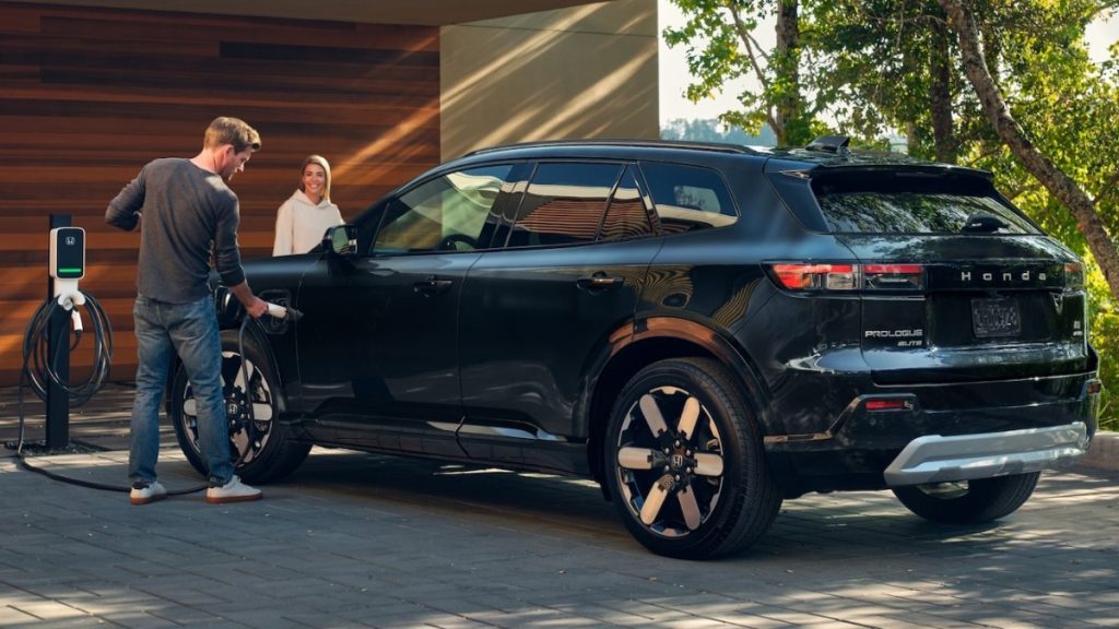 2025 Honda Prologue Elite shown in Raven Black Actual product may vary differ from the home charger shown