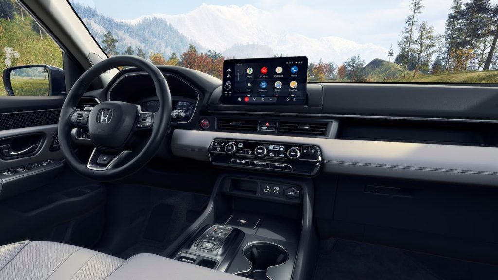 Interior display tech view of a 2025 Honda Pilot Elite shown with Gray Leather