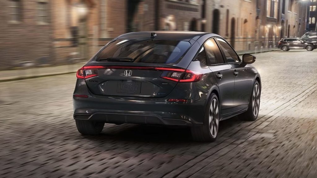 Honda Civic Hatchback Sport Touring Hybrid shown in Meteorite Gray Metallic.