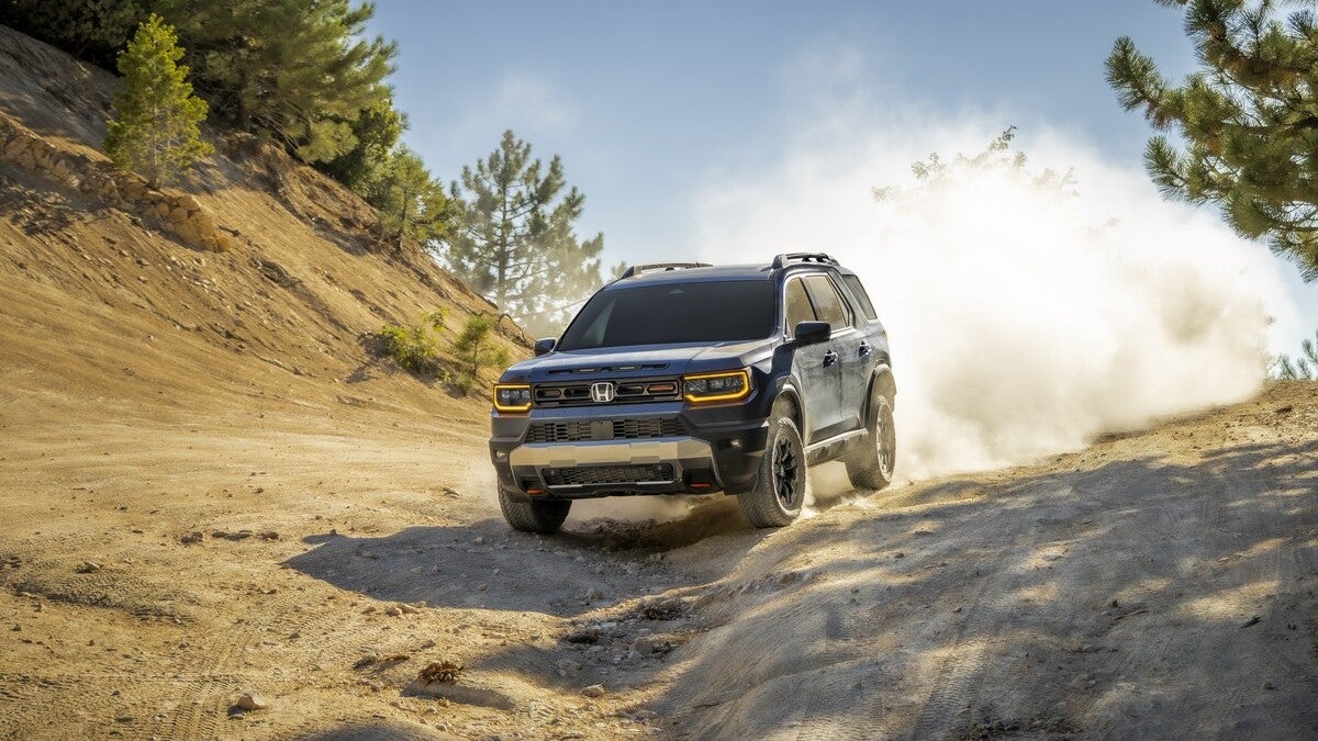 2027 Honda Passport TrailSport driving off-road.
